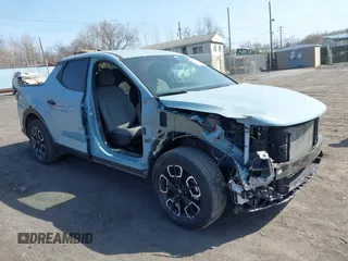 2024 Hyundai Santa Cruz SEL z VIN 5NTJBDAE3RH088530, wystawiony jako IAAI lot #41785149 z przebiegiem 21 560 mil mil oraz . Historia ofert i sprzedaży dostępna na DreamBid. Obrazek 1.
