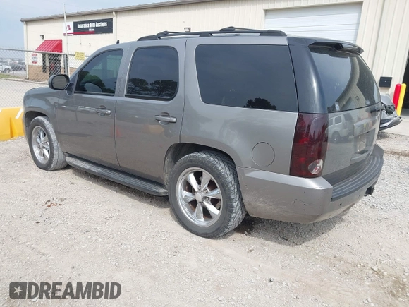 2007 GMC Yukon SLT with VIN 1GKFC13057R126741, listed as a IAAI auction lot 41910018 with 244,921 mi miles. Bid and sale history available at carsss.com. Image 3.