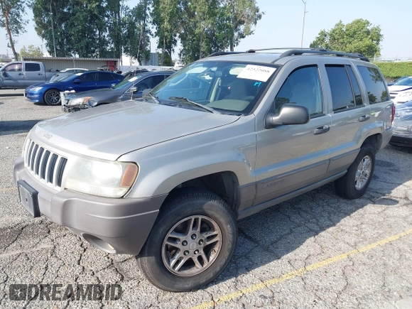2004 Jeep Grand Cherokee Laredo with VIN 1J4GX48N24C334983, listed as a IAAI auction lot 42522088 with 169,793 mi miles and . Bid and sale history available at DreamBid. Image 17.