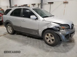 2005 Kia Sorento LX z VIN KNDJC733X55368884, wystawiony jako Copart lot #54858715 z przebiegiem 136 993 mil mil oraz Szkoda całkowita • Salvage title. Historia ofert i sprzedaży dostępna na DreamBid. Obrazek 4.