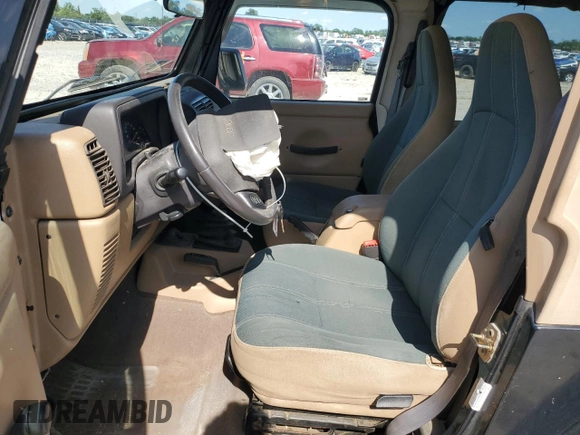 2001 Jeep Wrangler Sahara with VIN 1J4FA59S71P343366, listed as a Copart auction lot 57826405 with 156,436 mi miles and Salvage title. Bid and sale history available at DreamBid. Image 7.