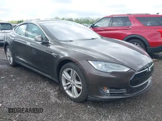 2014 Tesla Model S 60 z VIN 5YJSA1H19EFP51406, wystawiony jako IAAI lot #42179183 z przebiegiem 157 000 mil mil oraz . Historia ofert i sprzedaży dostępna na DreamBid. Obrazek 1.