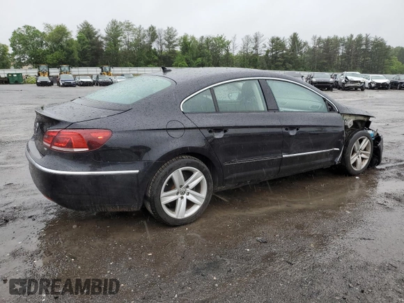 2013 Volkswagen CC Sport Plus with VIN WVWBP7AN6DE507128, listed as a Copart auction lot 56759035 with 77,140 mi miles and Salvage title. Bid and sale history available at DreamBid. Image 3.