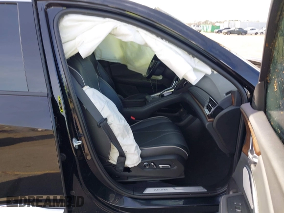 2021 Acura RDX w/Advance Package with VIN 5J8TC1H74ML011746, listed as a IAAI auction lot 41331679 with 72,676 mi miles. Bid and sale history available at carsss.com. Image 5.
