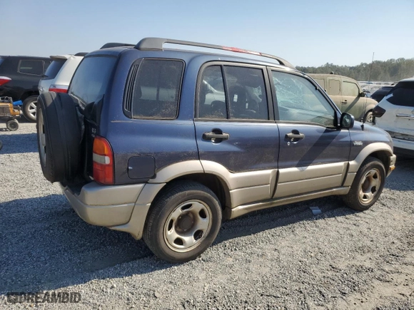 2002 Suzuki Grand Vitara JLX with VIN JS3TD62V424152230, listed as a Copart auction lot 74657294 with 160,135 mi miles and Salvage Title. Bid and sale history available at carsss.com. Image 3.