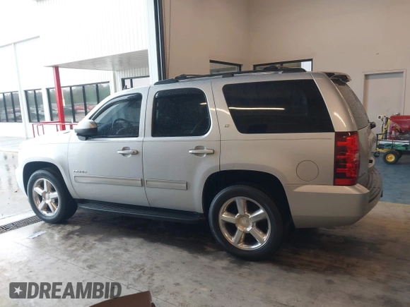 2010 Chevrolet Tahoe LT with VIN 1GNMCBE35AR114622, listed as a IAAI auction lot 41974795 with 248,109 mi miles and . Bid and sale history available at DreamBid. Image 14.