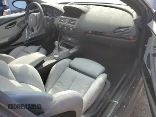 2006 BMW M6 z VIN WBSEH93496B797016, wystawiony jako Copart lot #45987075 z przebiegiem 51 374 mil mil oraz Czysty tytuł • Clean title. Historia ofert i sprzedaży dostępna na DreamBid. Obrazek 8.