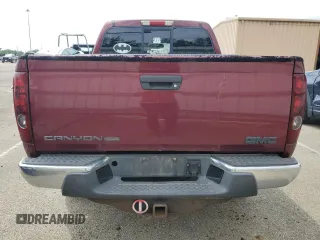 2008 GMC Canyon SLE2 z VIN 1GTDT13E088118164, wystawiony jako Copart lot #60001825 z przebiegiem 227 793 mil mil oraz Czysty tytuł • Clean title. Historia ofert i sprzedaży dostępna na DreamBid. Obrazek 6.