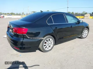 2014 Volkswagen Jetta SE z VIN 3VWD17AJ4EM419839, wystawiony jako IAAI lot #41994141 z przebiegiem 102 068 mil mil oraz . Historia ofert i sprzedaży dostępna na DreamBid. Obrazek 4.