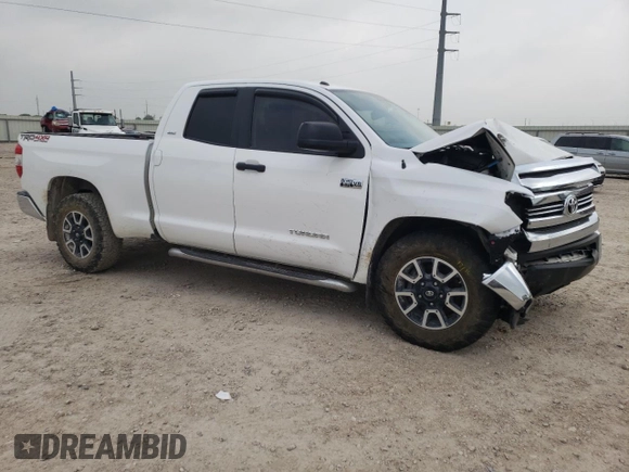 2016 Toyota Tundra 4WD Truck SR with VIN 5TFUW5F19GX561943, listed as a Copart auction lot 55828443 with 124,236 mi miles. Bid and sale history available at carsss.com. Image 4.