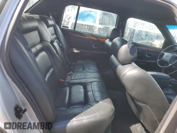 1999 Cadillac DeVille z VIN 1G6KD54Y5XU774986, wystawiony jako Copart lot #50167955 z przebiegiem 151 375 mil mil oraz Czysty tytuł • Clean title. Historia ofert i sprzedaży dostępna na DreamBid. Obrazek 10.