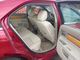 2009 Lincoln MKZ z VIN 3LNHM28T09R633561, wystawiony jako IAAI lot #40751995 z przebiegiem 161 001 mil mil oraz . Historia ofert i sprzedaży dostępna na DreamBid. Obrazek 8.