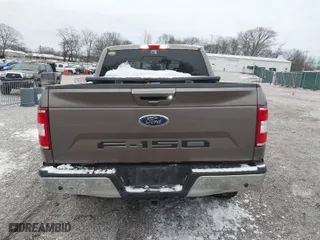 2019 Ford F-150 XL with VIN 1FTEW1E58KKF26818, listed as a IAAI auction lot 41270869 with 112,931 mi miles. Bid and sale history available at carsss.com. Image 16.