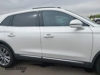 2016 Lincoln MKX Reserve with VIN 2LMTJ8LP2GBL84440, listed as a IAAI auction lot 41900199 with 109,724 mi miles. Bid and sale history available at carsss.com. Image 12.