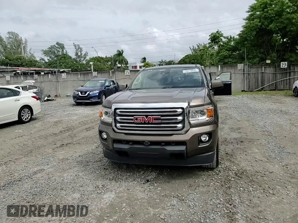 2015 GMC Canyon 4WD SLE with VIN 1GTG6BE38F1263139, listed as a Copart auction lot 75479854 with 124,765 mi miles and Salvage Title. Bid and sale history available at carsss.com. Image 10.