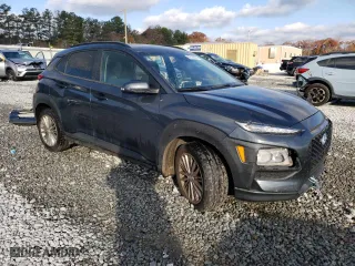 2021 Hyundai Kona SEL with VIN KM8K22AA7MU607366, listed as a Copart auction lot 82189284 with 100,544 mi miles and Salvage Title. Bid and sale history available at carsss.com. Image 4.