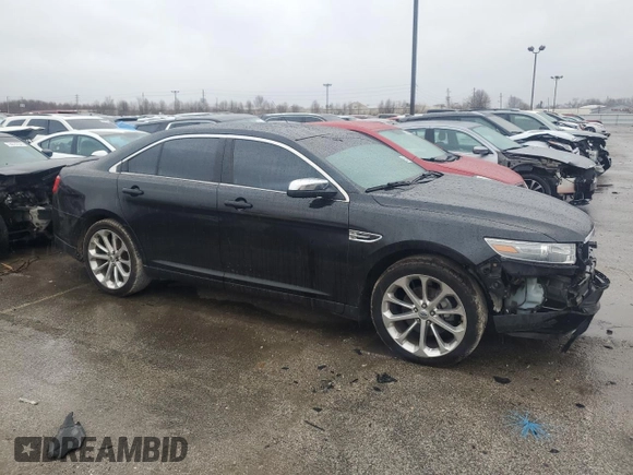 2013 Ford Taurus Limited z VIN 1FAHP2F80DG216618, wystawiony jako Copart lot #85572994 z przebiegiem 185 697 mil mil oraz Szkoda całkowita • Salvage title. Historia ofert i sprzedaży dostępna na DreamBid. Obrazek 4.
