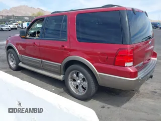 2004 Ford Expedition Eddie Bauer with VIN 1FMPU17LX4LB81956, listed as a IAAI auction lot 42064799 with 142,049 mi miles. Bid and sale history available at carsss.com. Image 3.