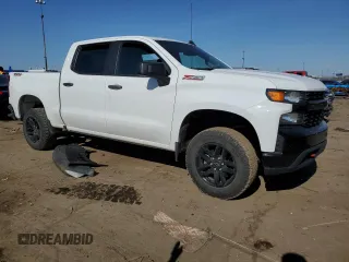 2021 Chevrolet Silverado 1500 Custom Trail Boss with VIN 1GCPYCEF3MZ352934, listed as a Copart auction lot 48747415 with 56,017 mi miles and Salvage Title. Bid and sale history available at DreamBid. Image 4.