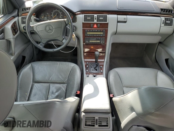 1997 Mercedes-Benz E-Class with VIN WDBJF72F8VA462335, listed as a Copart auction lot 50230895 with 97,831 mi miles and Salvage Title. Bid and sale history available at carsss.com. Image 8.