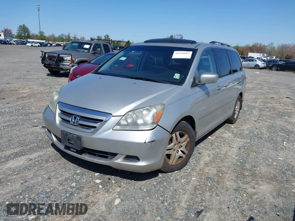 2007 Honda Odyssey EX-L with VIN 5FNRL387X7B080906, listed as a IAAI auction lot 41910061 with 229,717 mi miles and . Bid and sale history available at DreamBid. Image 17.