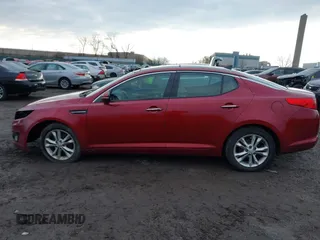 2013 Kia Optima EX z VIN 5XXGN4A78DG141924, wystawiony jako IAAI lot #41474952 z przebiegiem 172 814 mil mil oraz . Historia ofert i sprzedaży dostępna na DreamBid. Obrazek 13.