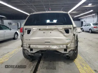 2014 Jeep Grand Cherokee Limited z VIN 1C4RJFBG1EC148908, wystawiony jako Copart lot #54311675 z przebiegiem 90 886 mil mil oraz Szkoda całkowita • Salvage title. Historia ofert i sprzedaży dostępna na DreamBid. Obrazek 6.