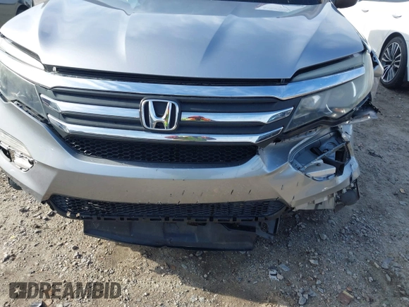 2016 Honda Pilot LX with VIN 5FNYF5H17GB029339, listed as a IAAI auction lot 41837038 with Not Provided miles and . Bid and sale history available at DreamBid. Image 17.