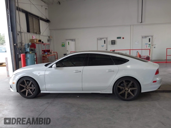 2012 Audi A7 Prestige with VIN WAU3GAFC9CN073453, listed as a IAAI auction lot 42698833 with 82,643 mi miles and . Bid and sale history available at DreamBid. Image 14.