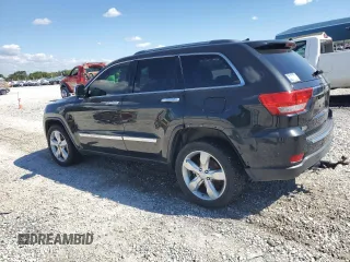 2013 Jeep Grand Cherokee Overland with VIN 1C4RJECG5DC595989, listed as a Copart auction lot 73385354 with 157,876 mi miles and Clean Title. Bid and sale history available at carsss.com. Image 2.