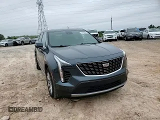 2021 Cadillac XT4 AWD Premium Luxury z VIN 1GYFZDR4XMF000937, wystawiony jako Copart lot #52406055 z przebiegiem 46 881 mil mil oraz Szkody całkowita. Historia ofert i sprzedaży dostępna na DreamBid. Obrazek 12.