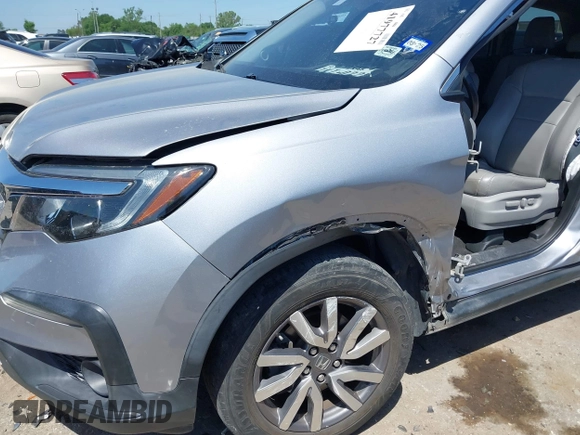 2019 Honda Pilot EX-L with VIN 5FNYF5H58KB040331, listed as a IAAI auction lot 41977727 with 90,655 mi miles and . Bid and sale history available at DreamBid. Image 6.