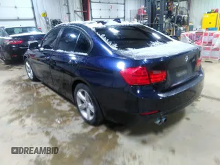 2014 BMW 3 Series 328i xDrive with VIN WBA3B3C57EF545372, listed as a IAAI auction lot 42078980 with 116,627 mi miles and . Bid and sale history available at carsss.com. Image 3.