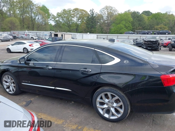 2014 Chevrolet Impala LTZ with VIN 1G1155S32EU155880, listed as a IAAI auction lot 41964572 with 184,992 mi miles and . Bid and sale history available at DreamBid. Image 14.
