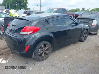 2013 Hyundai Veloster w/Black Int с VIN KMHTC6ADXDU084704, выставлен на аукционе IAAI как лот 42443297 с пробегом 111 587 миль миль и . История ставок и продаж доступна на DreamBid. Изображение 4.