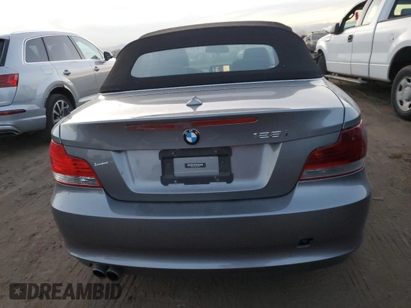 2012 BMW 1 Series 128i with VIN WBAUN1C5XCVH84145, listed as a Copart auction lot 82579054 with 40,309 mi miles and Salvage title. Bid and sale history available at DreamBid. Image 6.