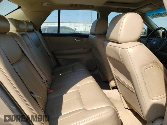 2006 Cadillac DTS 1SD z VIN 1G6KD57Y16U117113, wystawiony jako Copart lot #71485044 z przebiegiem 109 948 mil mil oraz Szkoda całkowita • Salvage title. Historia ofert i sprzedaży dostępna na DreamBid. Obrazek 10.
