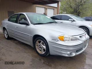 2004 Pontiac Grand Am GT with VIN 1G2NW52EX4C109231, listed as a IAAI auction lot 41845165 with 135,735 mi miles. Bid and sale history available at carsss.com. Image 1.