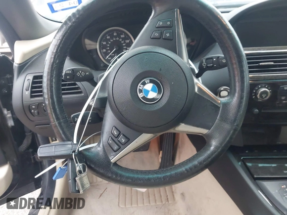 2006 BMW 6 Series 650Ci z VIN WBAEK13416CN79394, wystawiony jako IAAI lot #42420470 z przebiegiem 114 720 mil mil oraz . Historia ofert i sprzedaży dostępna na DreamBid. Obrazek 11.