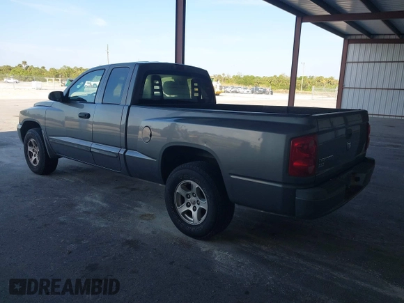 2006 Dodge Dakota SLT with VIN 1D7HE42K96S503989, listed as a IAAI auction lot 41709529 with 138,226 mi miles and . Bid and sale history available at carsss.com. Image 3.