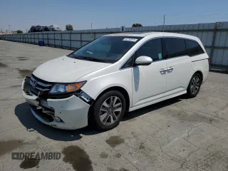 2014 Honda Odyssey Touring with VIN 5FNRL5H93EB025448, listed as a Copart auction lot 64759915 with 75,880 mi miles and Salvage title. Bid and sale history available at DreamBid. Image 1.