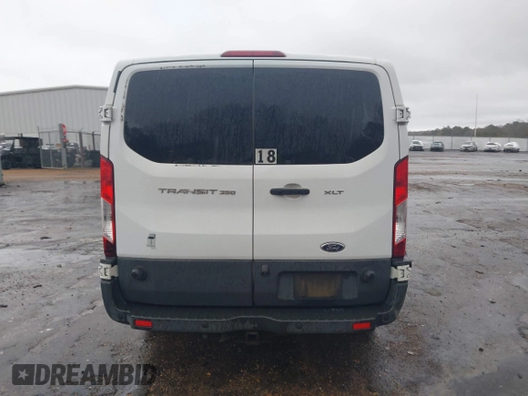 2015 Ford Transit XL with VIN 1FBZX2YM6FKA80301, listed as a IAAI auction lot 41549441 with 310,164 mi miles and . Bid and sale history available at DreamBid. Image 16.