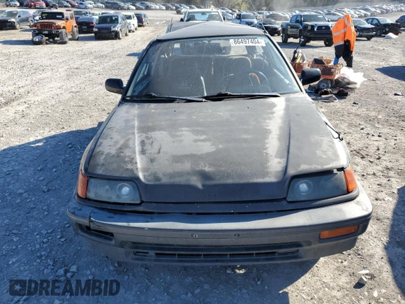 1989 Honda Civic z VIN JHMED6451KS002428, wystawiony jako Copart lot #86497404 z przebiegiem 241 207 mil mil oraz Szkoda całkowita • Salvage title. Historia ofert i sprzedaży dostępna na DreamBid. Obrazek 5.