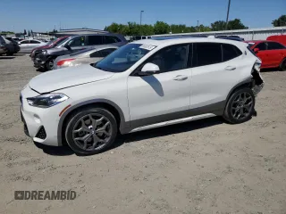 2018 BMW X2 xDrive28i z VIN WBXYJ5C38JEF79297, wystawiony jako Copart lot #56062515 z przebiegiem 74 322 mil mil oraz Szkoda całkowita • Salvage title. Historia ofert i sprzedaży dostępna na DreamBid. Obrazek 1.