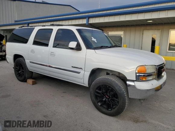 2004 GMC Yukon XL SLE with VIN 3GKEC16T44G205024, listed as a Copart auction lot 51658765 with 0 mi miles and Salvage Title. Bid and sale history available at carsss.com. Image 4.