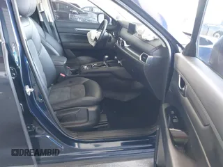 2020 Mazda CX-5 Touring z VIN JM3KFACM2L0802461, wystawiony jako IAAI lot #42148039 z przebiegiem 57 963 mil mil oraz . Historia ofert i sprzedaży dostępna na DreamBid. Obrazek 5.