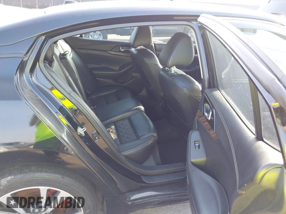2016 Nissan Maxima SL z VIN 1N4AA6AP1GC383512, wystawiony jako IAAI lot #41490666 z przebiegiem 110 235 mil mil oraz . Historia ofert i sprzedaży dostępna na DreamBid. Obrazek 8.