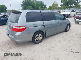 2005 Honda Odyssey EX-L z VIN 5FNRL38775B117598, wystawiony jako IAAI lot #42276239 z przebiegiem 184 134 mil mil oraz . Historia ofert i sprzedaży dostępna na DreamBid. Obrazek 4.