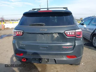 2017 Jeep Compass Trailhawk with VIN 3C4NJDDBXHT657425, listed as a IAAI auction lot 41022289 with 83,003 mi miles and . Bid and sale history available at DreamBid. Image 16.