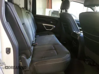2017 Nissan Titan SV z VIN 1N6AA1E57HN569872, wystawiony jako Copart lot #53254555 z przebiegiem 170 573 mil mil oraz Szkoda całkowita • Salvage title. Historia ofert i sprzedaży dostępna na DreamBid. Obrazek 10.